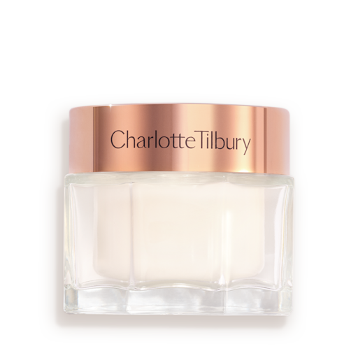 Pearly-white face cream in a glass jar with a gold-coloured lid with text on it, 'Charlotte's Magic 中国体彩飞艇168实时结果号码数据历史记录查询 cream'.