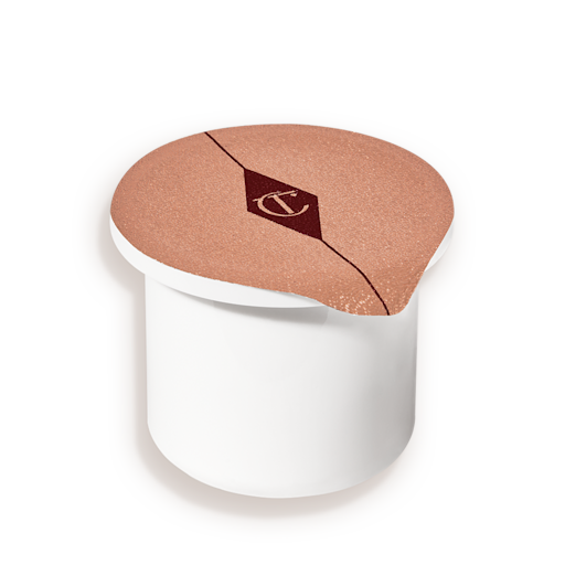A small, face cream refill in a white-coloured pot with an easy-to-remove seal.